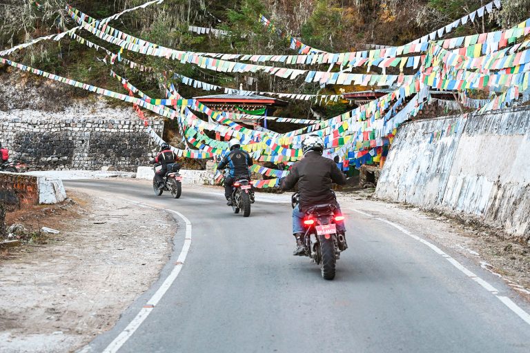 Riding Bhutan highest passes on a motorbike